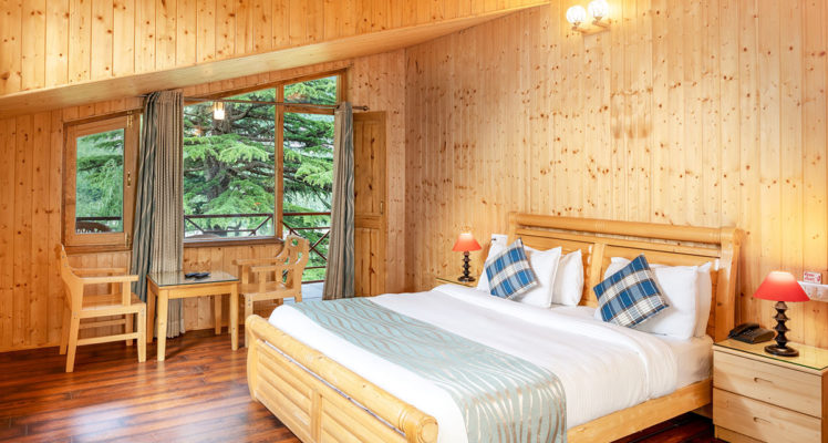 luxury-attic-room-shobla-pine-royale-seating-area-bed