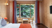 luxury-cottage-room-shobla-pine-royale-bed-seating-area